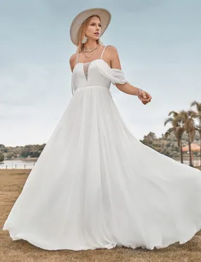 Robe de mariée brodée en mousseline de soie ivoire, à épaules dénudées